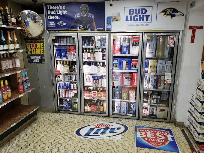 Interior of Carriage House Liquors showing beer coolers and wine selection in Westminster Maryland