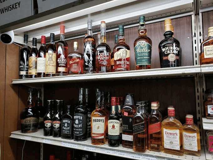 Whiskey bottles on shelves at Carriage House Liquors in Westminster Maryland